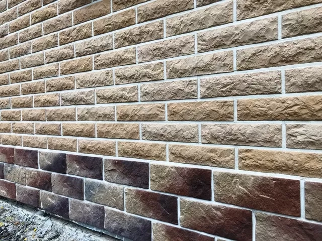 отделка стен и цоколя дома искусственным камнем
