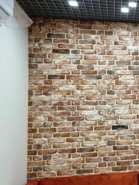 облицовка стен камнем с имитацией кирпичной кладки